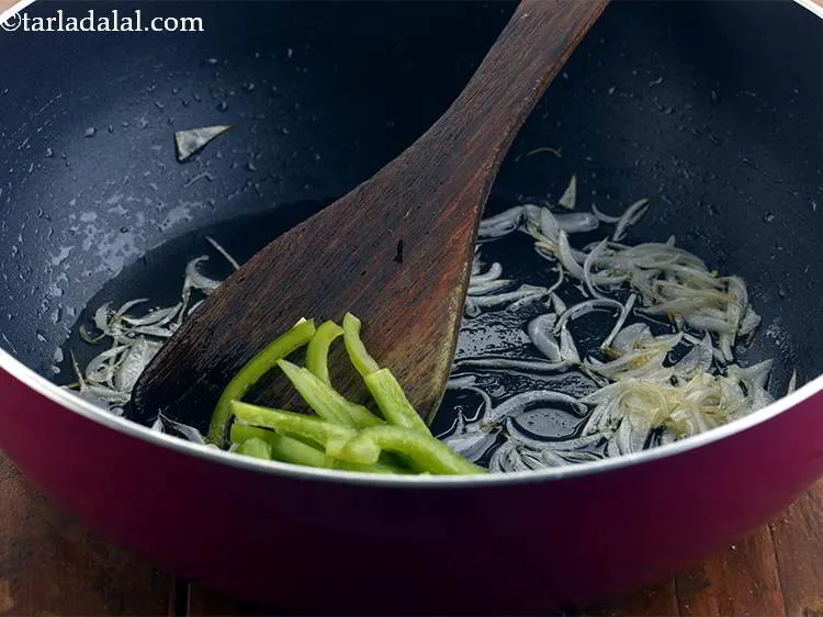Step 4 – Now, add the bell peppers to the <strong>Baby corn Paneer Jalfrazie</strong>.We have used all three …