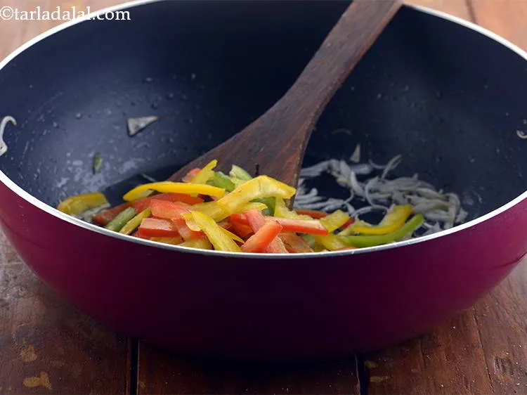 Step 5 – Now, add the red and yellow capsicums as well.