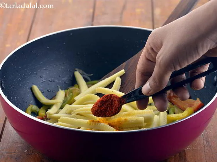 Step 9 – Add the chilli powder.