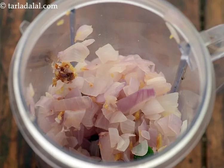 Step 14 – Switch off the flame and cool slightly. Transfer them to a mixer jar. &nbsp;