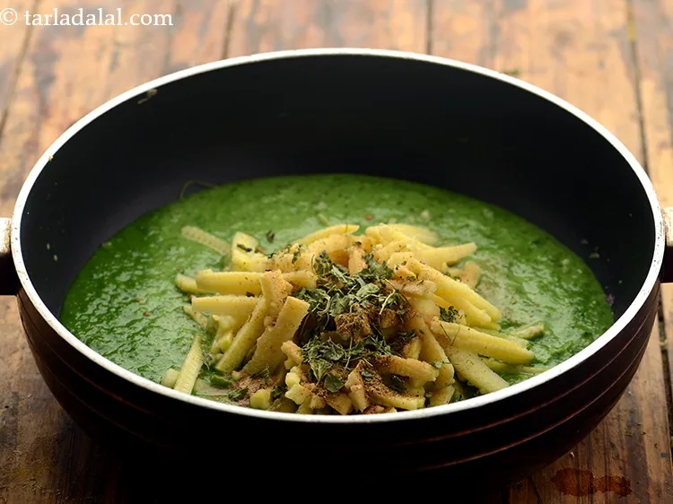 Step 24 – Add dried fenugreek leaves. With a pleasantly bitter bite, it is ideally sprinkled to balance …