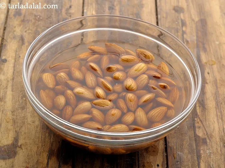Step 3 – Remember to use hot water for soaking. This helps to peel the almonds easily.