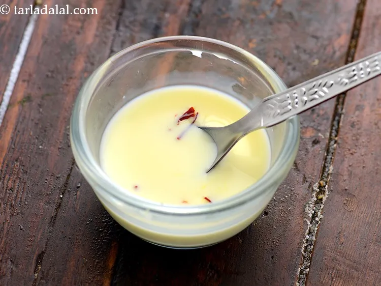 Step 30 – Add the saffron milk.