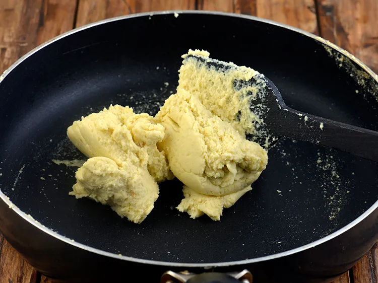 Step 6 – Keep stirring it continuously to prevent the mixture from sticking to the pan.