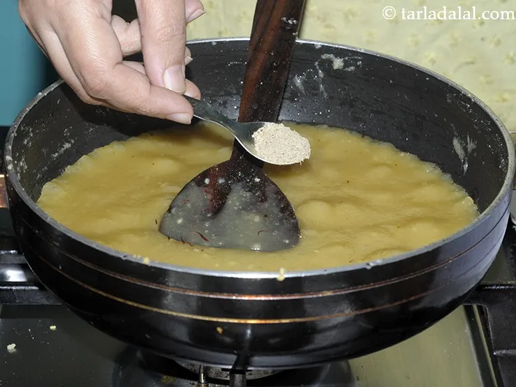 Step 27 – Switch off the flame, add cardamom powder to the&nbsp;<strong>badam ka halwa recipe | badam halwa …