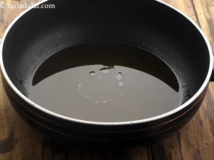 Step 13 – To begin making almond halwa recipe, heat the ghee in a deep non-stick kadhai. Ideally, …