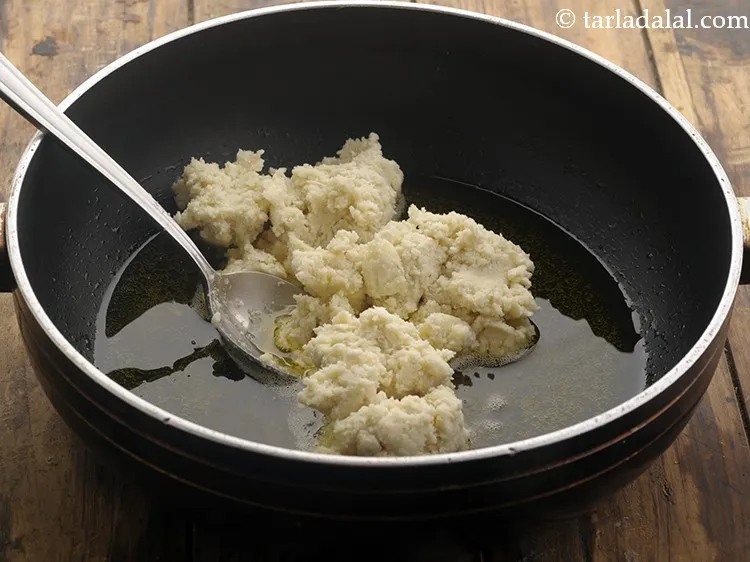 Step 14 – Once the ghee is hot and melted, add the almond mixture