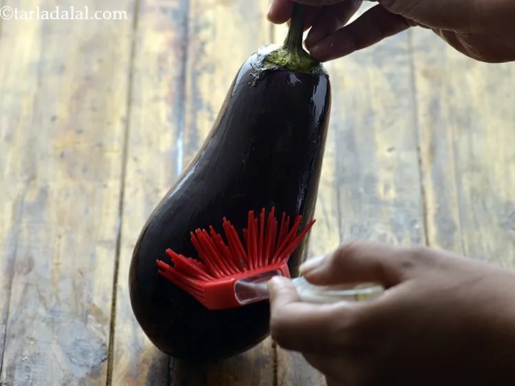Step 2 – To make <strong>Baingan Bharta</strong>, grease the eggplant with oil using your hands or a brush. …