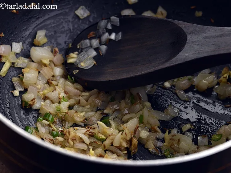 Step 13 – Saut&eacute; for a few more seconds or till the raw smell goes away. Add green …