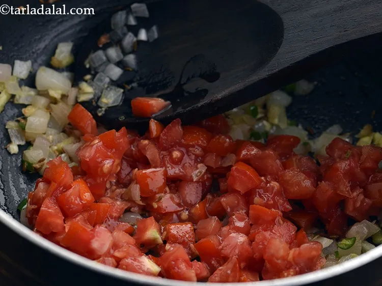 Step 14 – Add the tomatoes.