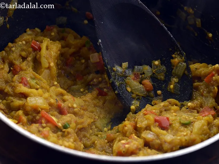 Step 19 – Mix well and cook for 3-4 minutes. Our&nbsp;<strong>Baingan Bharta</strong>&nbsp;is ready to serve.