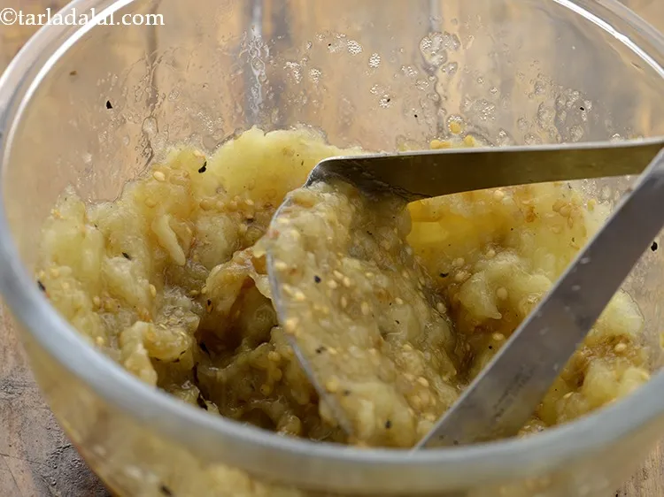 Step 6 – Transfer the eggplant to a bowl, mash the pulp thoroughly using a fork or potato …