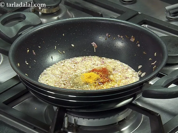 Step 14 – Add turmeric powder.