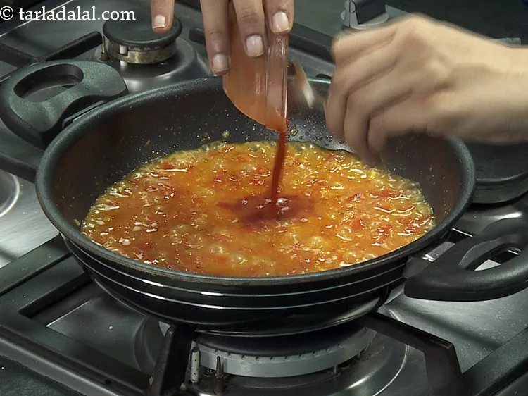 Step 19 – Add the tomato pur&eacute;e.