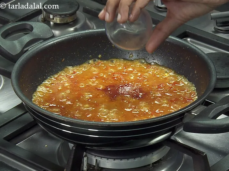 Step 20 – Add sugar to balance the tanginess from tomato and tomato puree.&nbsp;