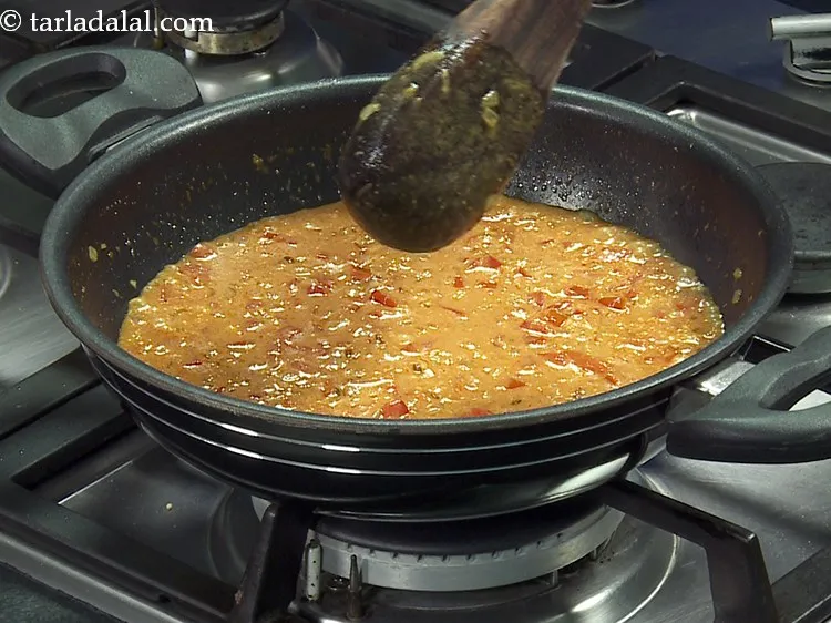 Step 23 – Mix well and cook on a medium flame for 2 minutes, while stirring occasionally.