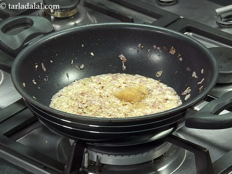 Step 11 – Add the ginger-garlic paste. &nbsp;You can make this <a href="https://www.tarladalal.com/Ginger--Garlic-Paste-(-Popular-Restaurant-Recipes-)-33530r" target="_blank"><strong>ginger garlic paste </strong></a>time ahead …