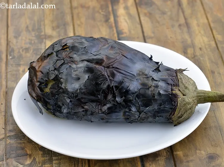 Step 4 – Once it&rsquo;s roasted well, remove from flame and insert a knife in the center to …