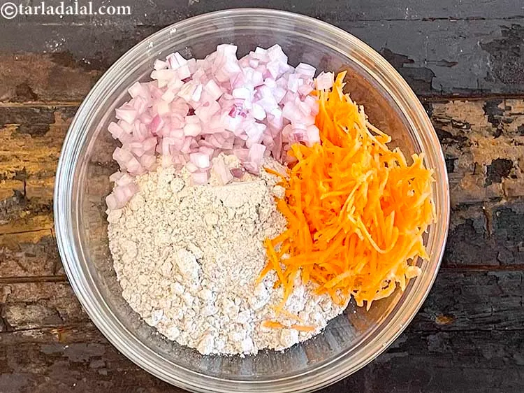 Step 18 – Add&nbsp;<meta charset="UTF-8" />1/2 cup&nbsp;finely&nbsp;<a href="glossary-chopped-onions-722i">chopped onions</a>.&nbsp;Raw <a href="https://www.tarladalal.com/recipes-using-onions-548">onions</a> are a very valuable source of&nbsp;<a href="https://www.tarladalal.com/recipes-for-Vitamin-C-Rich-Indian-Recipes-804" …