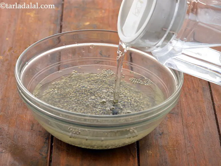 Step 4 – Add enough water to submerge the black millet (bajra).