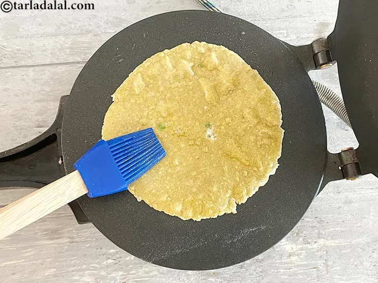 Step 36 – <meta charset="UTF-8" />Flip and cook again for 10 seconds apply &frac14; tsp of ghee on …