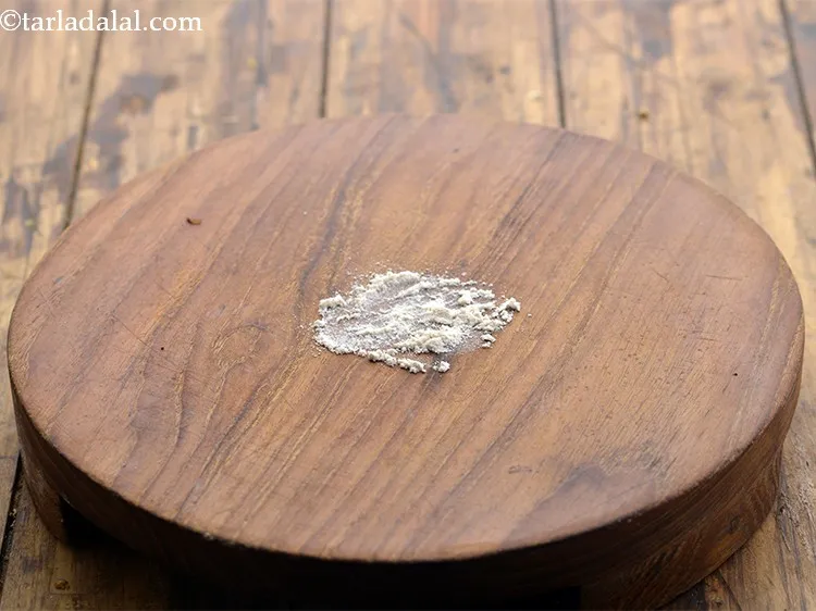 Step 14 – Sprinkle a little flour on the rolling surface.