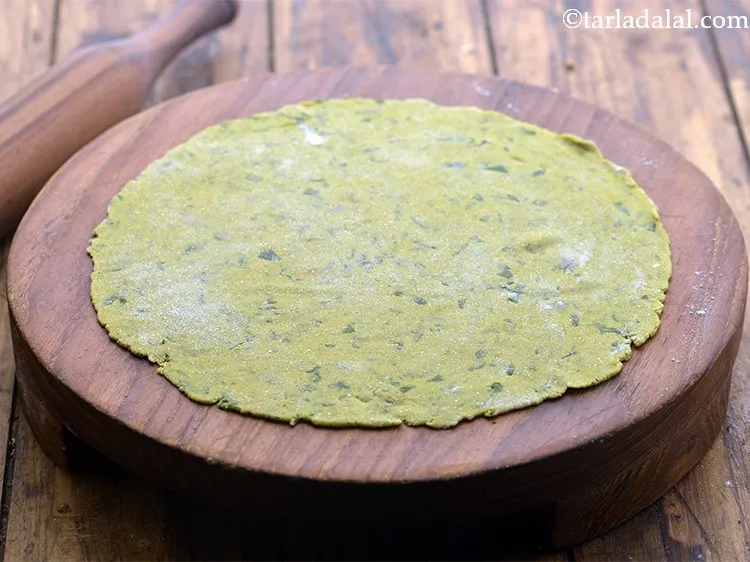 Step 27 – Roll out a portion of the dough into a 175 mm. (7&quot;) diameter thin circle, …