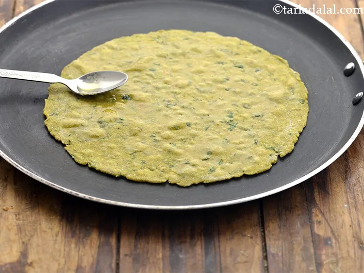 Step 18 – Apply &frac14; tsp of ghee on both sides. Ghee can be swapped with oil if …