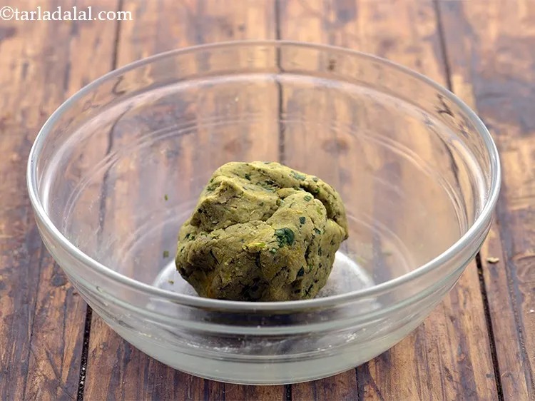 Step 12 – Gradually add warm water to form a dough. We have added approx. 4 to 5 …