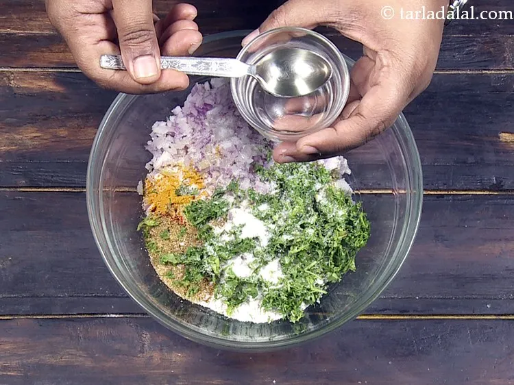 Step 12 – Add 1 tsp of <a href="https://www.tarladalal.com/glossary-oil-671i">oil</a>.&nbsp;