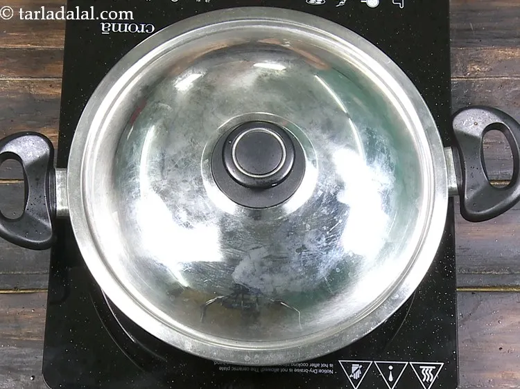 Step 31 – Cover with a lid and cook on a medium flame for 7 minutes, while stirring …