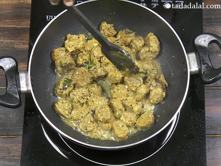 Step 33 – Mix gently and cook on a slow flame for another 8 minutes. You can stir …