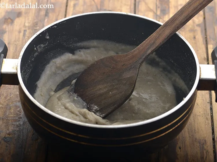 Step 16 – Cook <strong>Pearl Millet Porridge for Babies</strong> on a medium flame for 1 minute. Keep stirring …