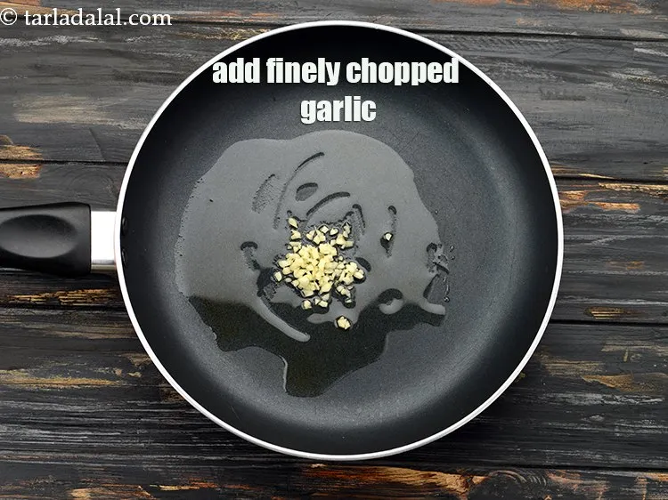 Step 5 – Add 1 tsp&nbsp;finely&nbsp;<a href="https://www.tarladalal.com/glossary-chopped-garlic-790i">chopped garlic (lehsun)</a>.
