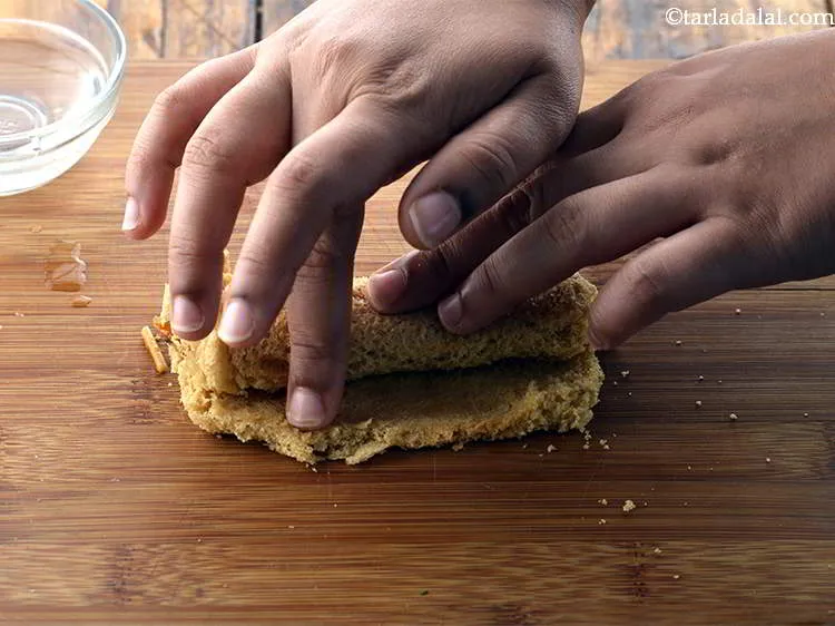 Step 27 – Apply some water at the edges and press gently to seal the stuffing.