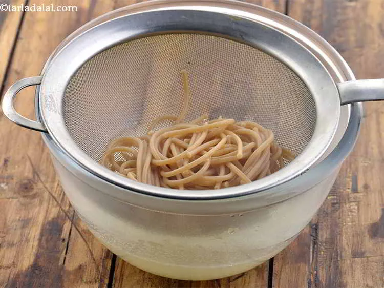 Step 7 – Drain the noodles and discard the water.