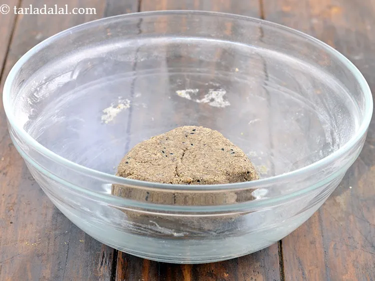 Step 15 – The dough should be stiff to get crisp puris.