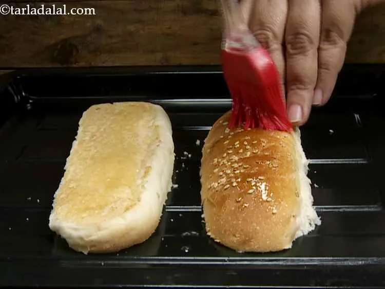 Step 12 – Invert them and brush the other side of each halves with a little melted butter.