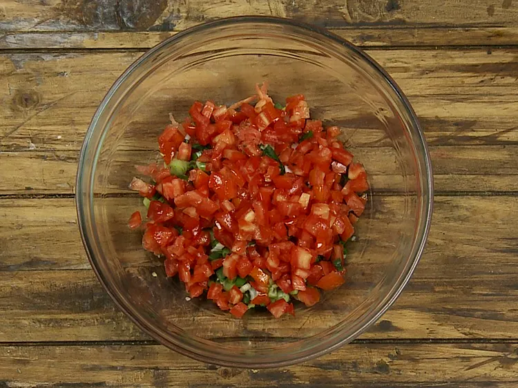Step 6 – Now add the deseeded and chopped tomatoes.