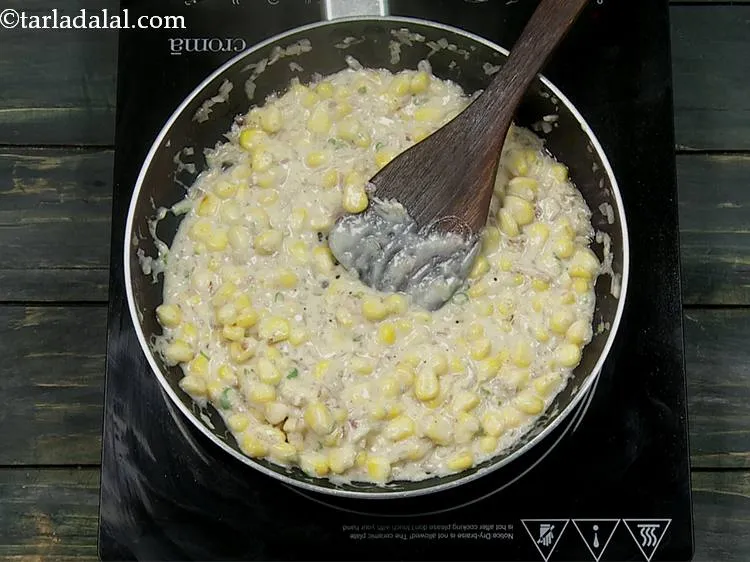 Step 14 – Mix well and cook on a medium flame for 2 minutes, while stirring occasionally and …