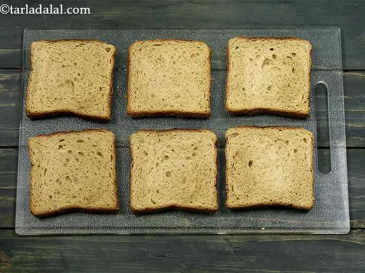 Step 17 – Place all the toasted bread on a clean, dry surface. We used white bread slices, …