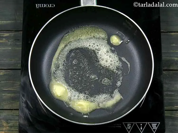 Step 8 – Heat the remaining 2 tsp of butter in another broad non-stick pan.