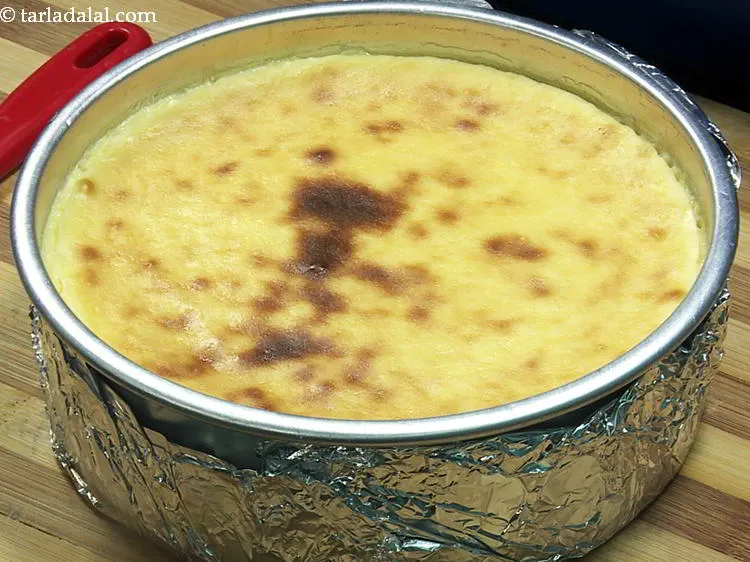 Step 23 – Refrigerate the <strong>baked gulab jamun and ladoo cheesecake</strong> for 2 hour until it is completely …