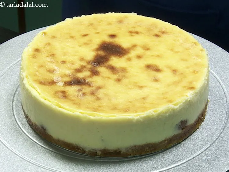 Step 25 – Pick up the cake tin and lightly push the cheesecake from all the sides. Demould …