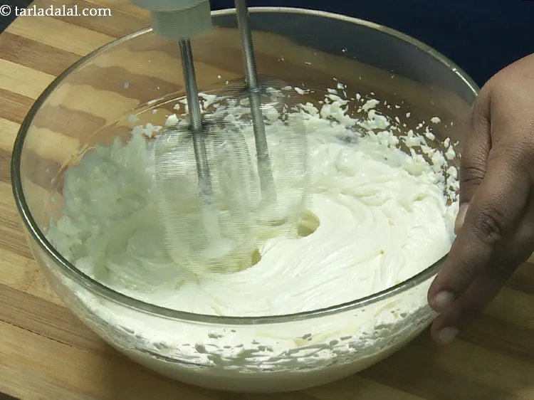 Step 11 – Beat it till smooth using an electric beater. No need to beat it stiff.