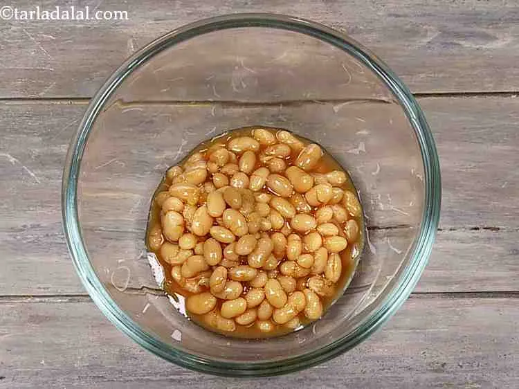 Step 3 – For the baked bean filling, take a deep bowl and add store-bought baked beans to …