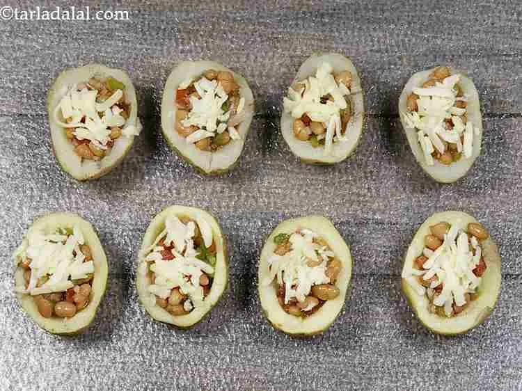 Step 13 – Sprinkle ? tsp of grated cheese. You can also use mozzarella cheese.