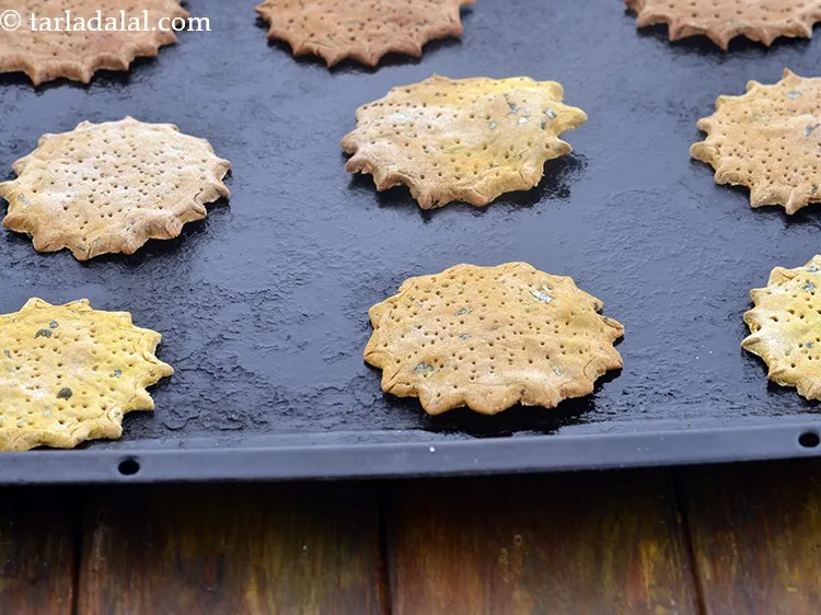 Step 35 – Do not forget to turn the mathri after baking for 15 minutes. This will ensure …