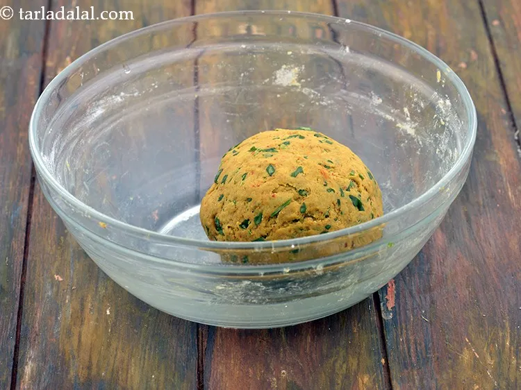 Step 23 – Mix well and knead into a semi- stiff dough using enough water.