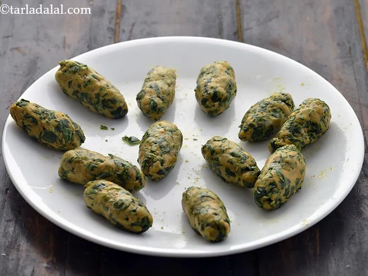 Step 15 – Shape each portion roughly into an oval by rolling it between your palms and fingers.